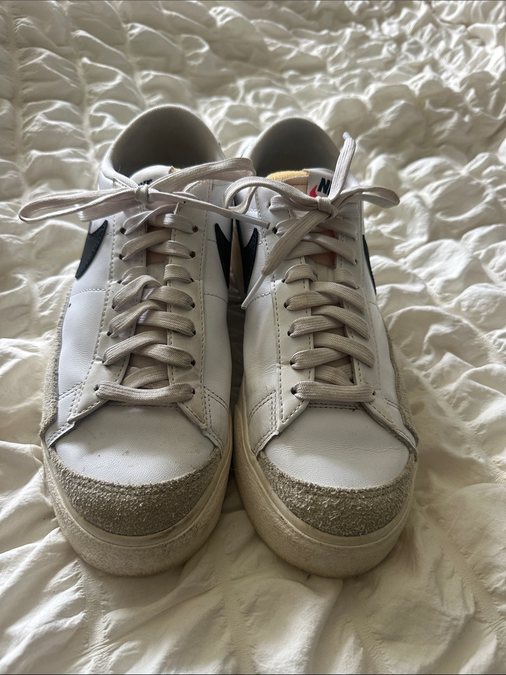 Nike White Sneakers with Black Swoosh and Cream Suede Trim